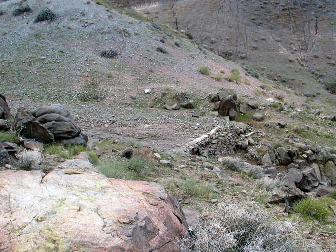 We cross the wash at the stone dam and begin the return hike.