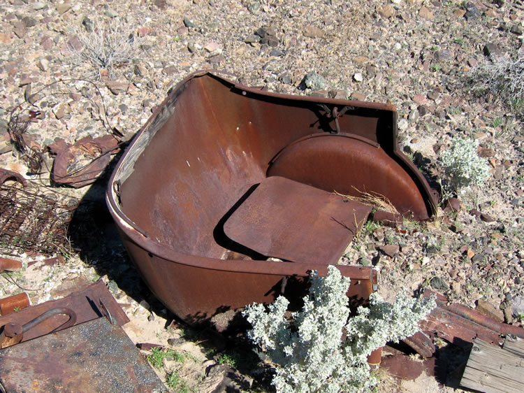 The rear tub body of a 1920's era car.