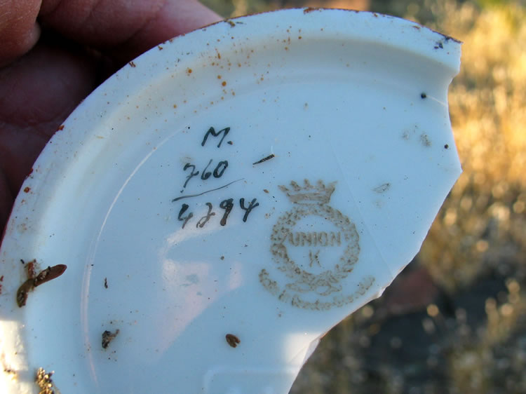 The back of another piece of china with an interesting notation.