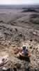 On the hillside adjacent to the mine Niki works a quartz vein and finds a pocket of crystals. (85kb)