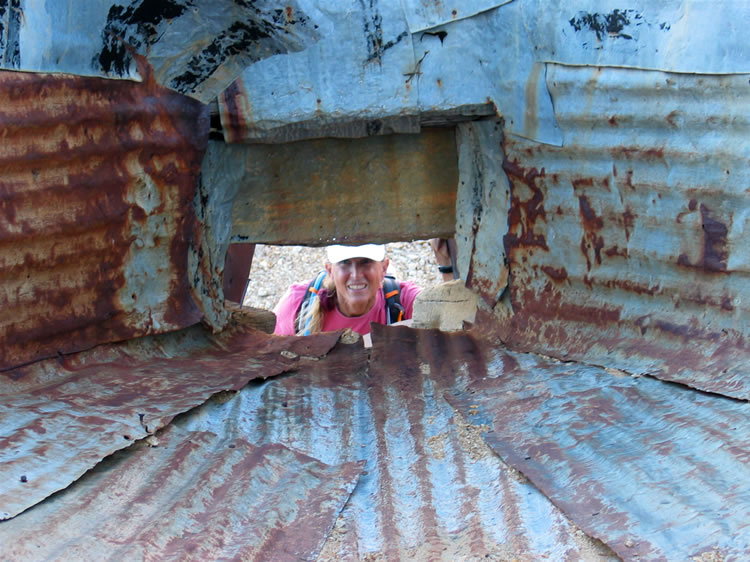 Jamie looks up into the ore hopper from below.
