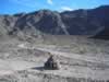 After two hours of hiking the cairn tells us we have arrived at the McCoy Spring site. (102kb)