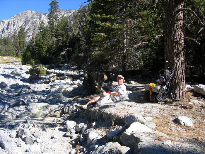 Chris supervises.  We were all sore, but we had a great time.  Next year we'll check out a different trail to the top.