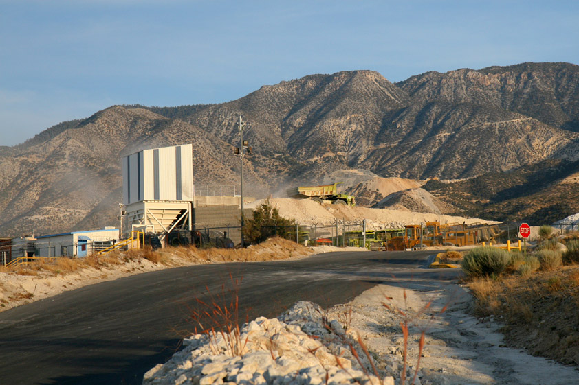 Even though it's a Saturday, the big haulers are still depositing their loads at the mill for processing.