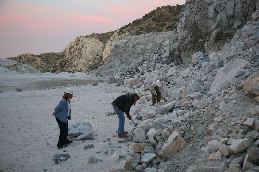 Howard's plan is to break off some chunks from the larger boulders while there's still enough light to see by.  Barbara keeps Howard and Jamie on task!