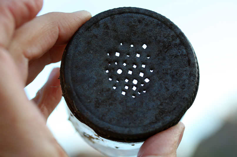 Some of the holes in this home made shaker were made by square nails.
