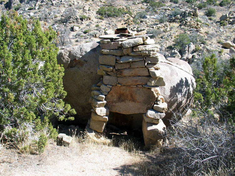 The fireplace is a real work of art!  Notice the massive stone just above the opening and the tiny fitted stones to chink larger gaps.
