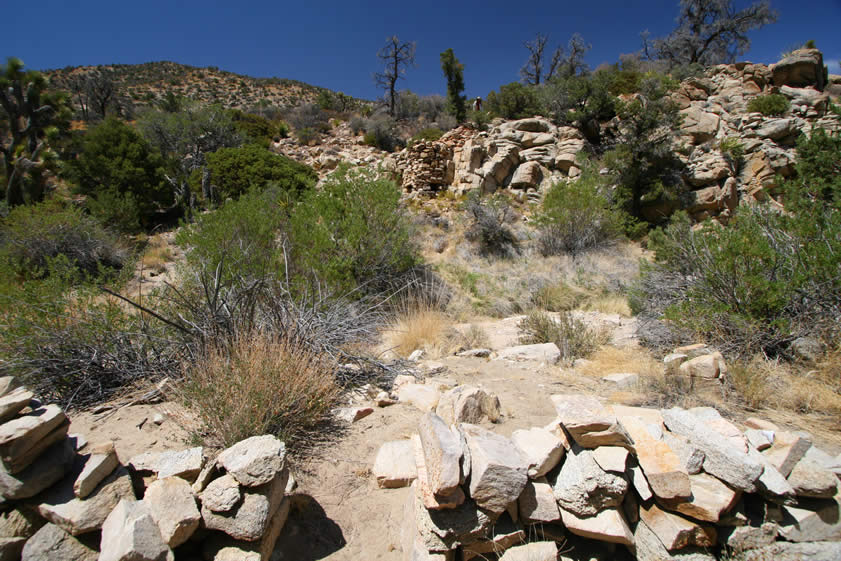This view from the doorway shows how close the smelter is to the cabin.