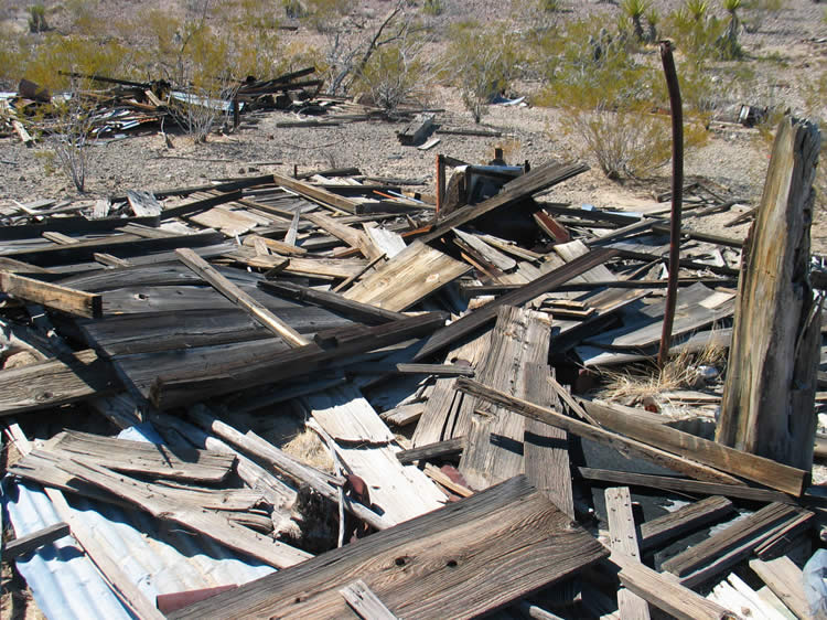On the way over, though, we pass through a debris field of trash and collapsed wood structures.