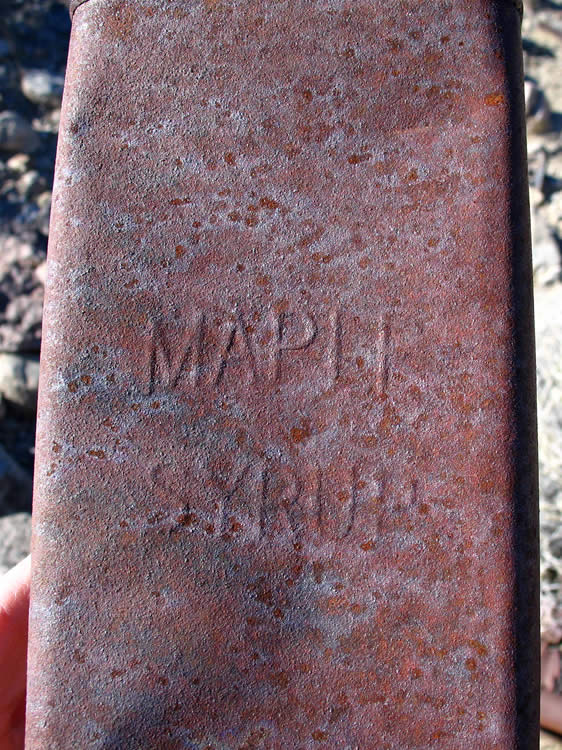 This large maple syrup tin has soldered seams and and a soldered cap.