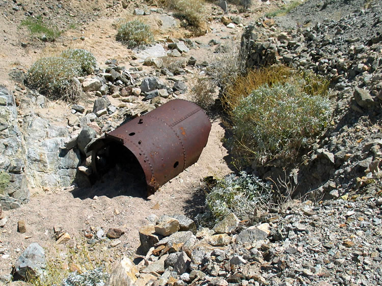 The remains of an old boiler in the bottom of the wash.