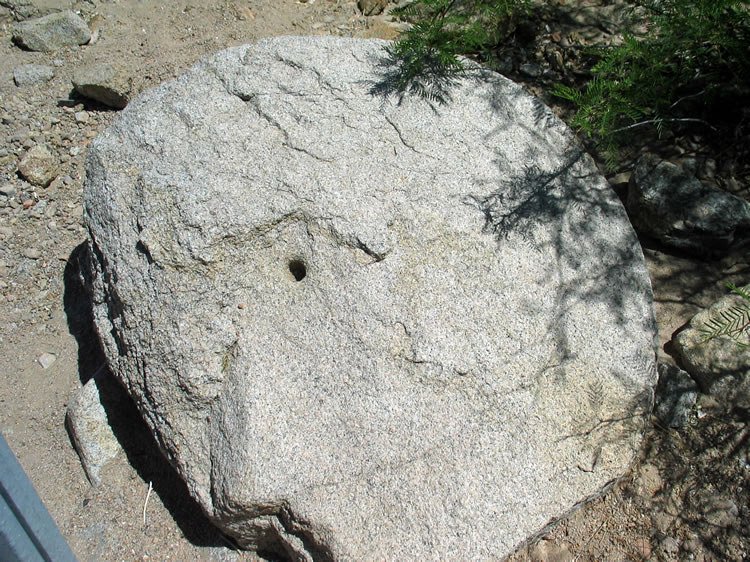 Here you can see the hole where the axle would have gone.  Unlike the other more traditional arrastras that were built in the wash, the Chilean Mill uses heavy rotating wheels to crush the ore instead of the usual drag stones.