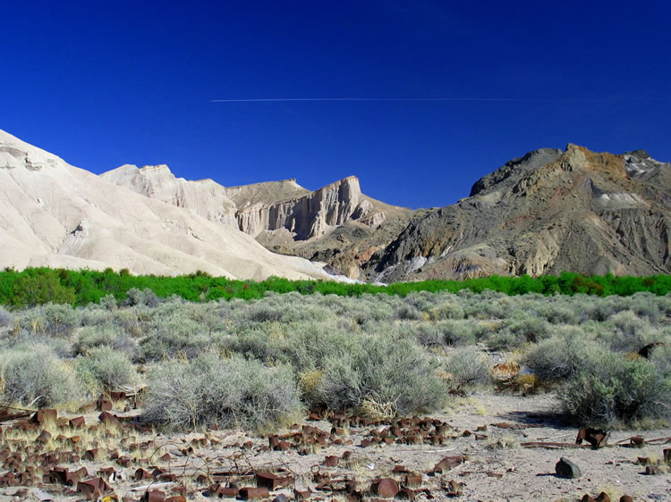 Not only is this a stunning image, but we like the elements of ancient geology, historic trash, and modern technology embodied in the jet plane all rolled into one photo.