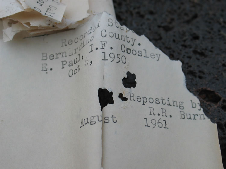 The papers were gently returned to their tobacco tin holder and replaced in the cairn.