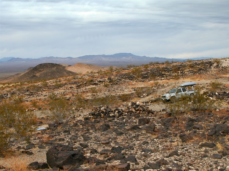 A view of the rock foundation, the truck and "Yin Yang Hill" from above as we start our hike.