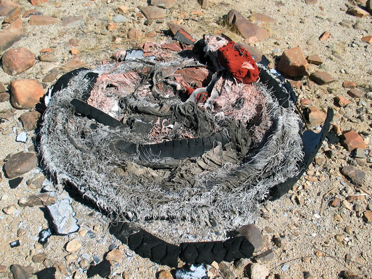 Some old tires in the area show what eighty years or so of desert exposure can do.