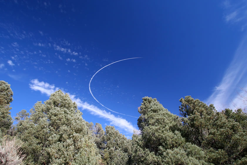 As we head away from the cabin to check out the nearby spring, we get to see what happens when a pilot forgets something after takeoff and has to go back!