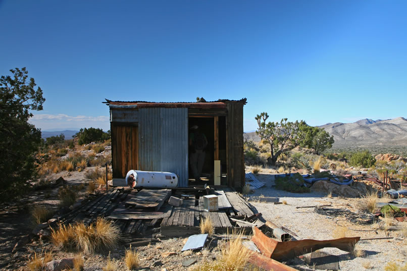 We've now worked our way up toward the site of Riley's mine.  This little workshop is located on the ridge across the wash from the mine site.