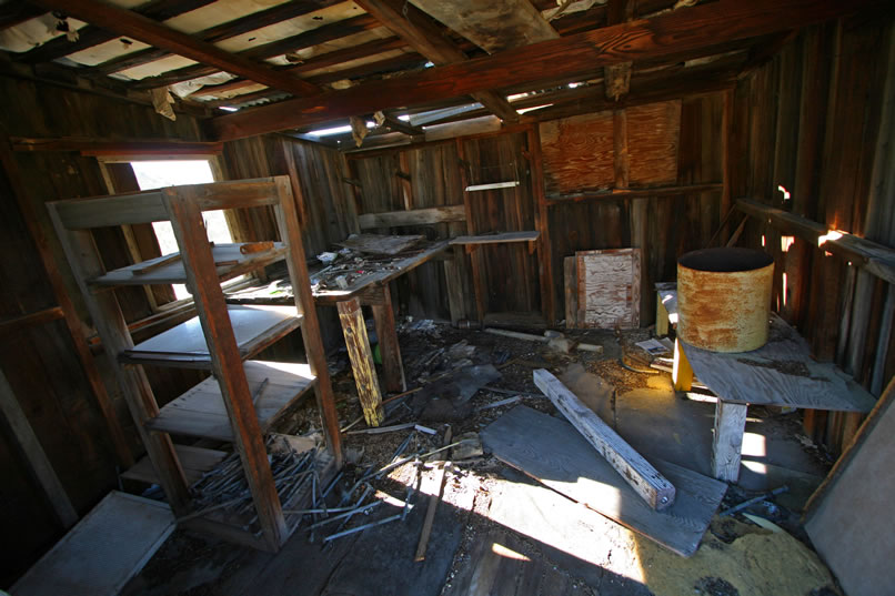 The interior still has various bits of hardware on the shelves and must at one time have been the center of activity.