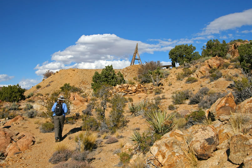 We take the foot path instead of the road to the mine because we want to look at the stacked stone retaining wall.