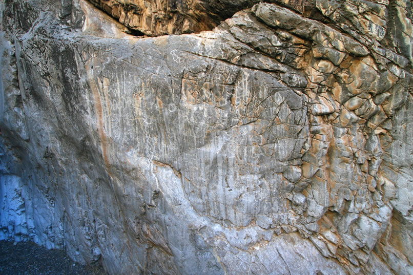Here's a closer look at them.  Like the other petros that we've seen here, they appear quite old and worn, possibly because of the intense weathering that must take place when torrents of water, rock and sand are washed down the canyon during a downpour.