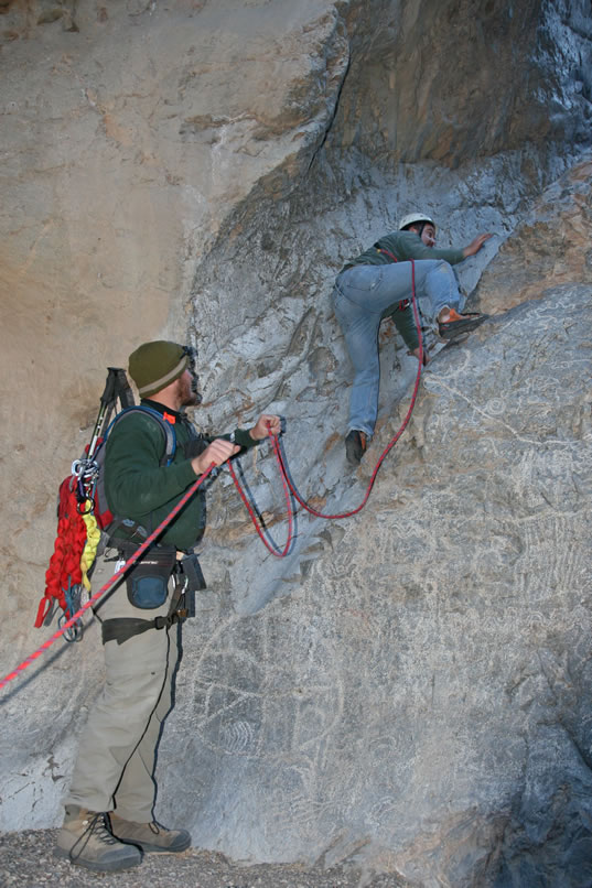 Even with the sticky soles of his rock climbing boots he struggles for traction.