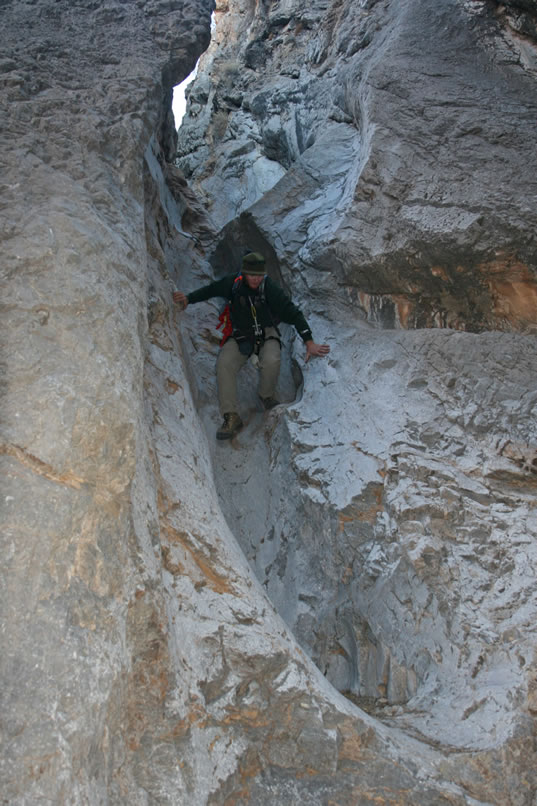 Dezdan's swift descent ends with a leap from the chute and a pose for the camera!