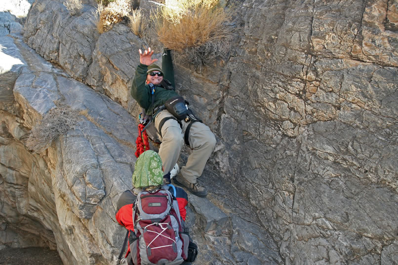 Dezdan, going webless, manages to slide on the gravel and save himself with a handhold and Jamie's grip on his boot.  He's such a showoff!  Heheheh.